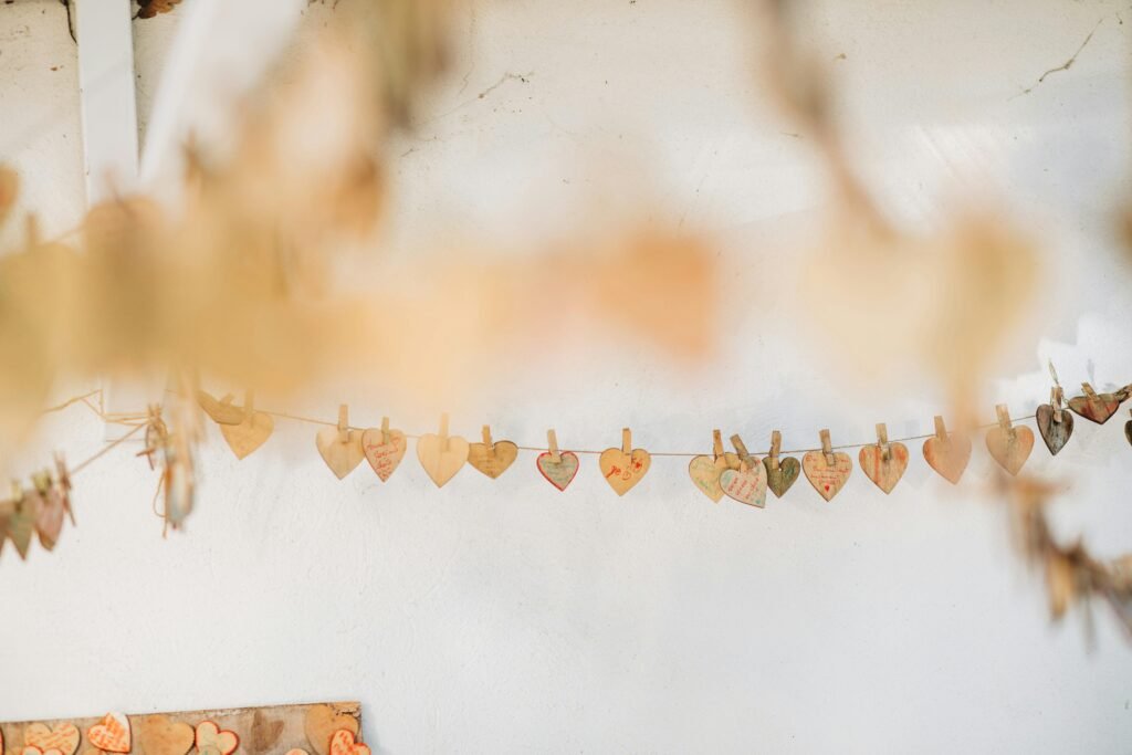 A charming heart garland on a string, perfect for rustic wedding or valentine's decoration.